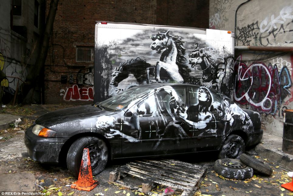 Name:  Banksy_Car.jpg
Views: 575
Size:  140.8 KB